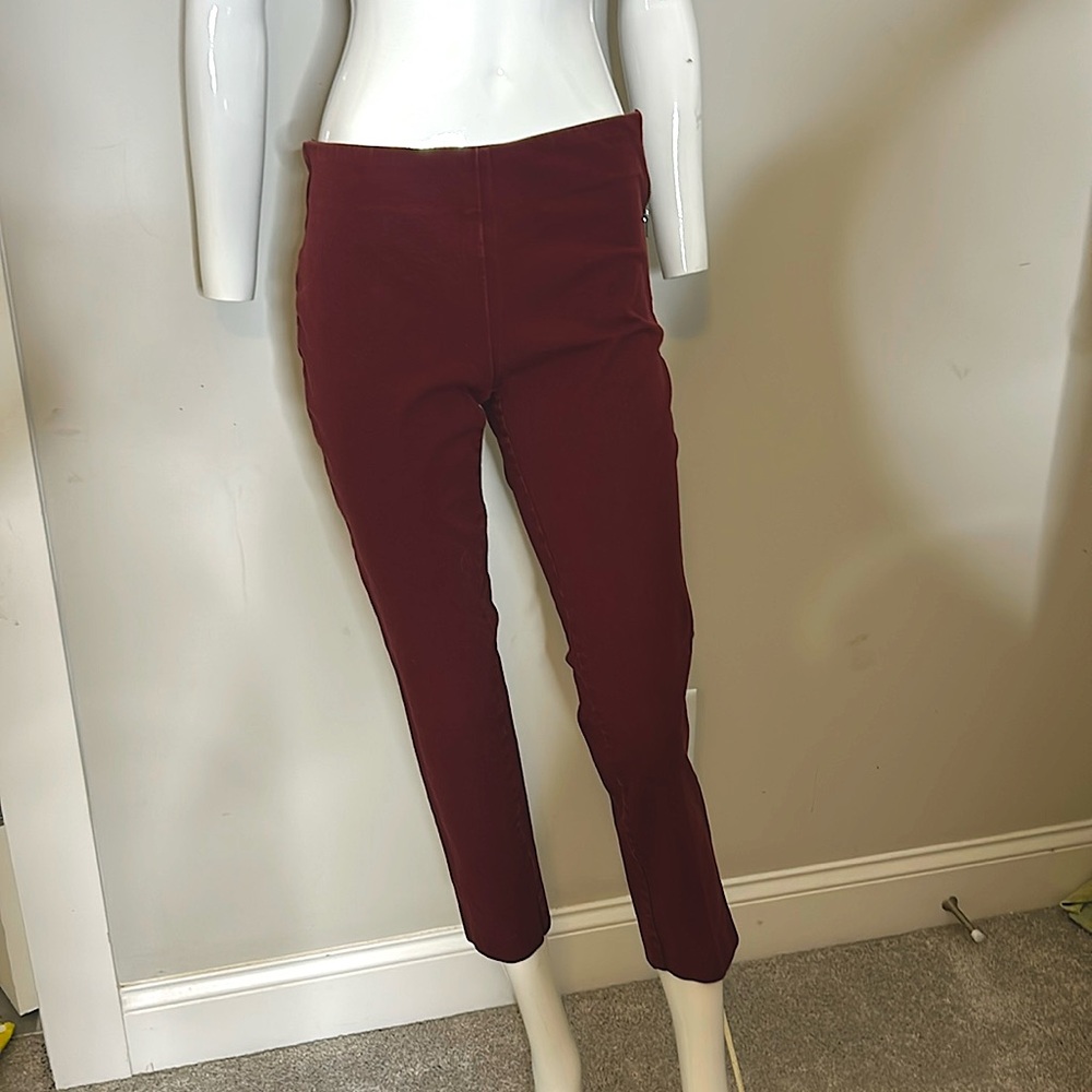 Im selling a dark red capris